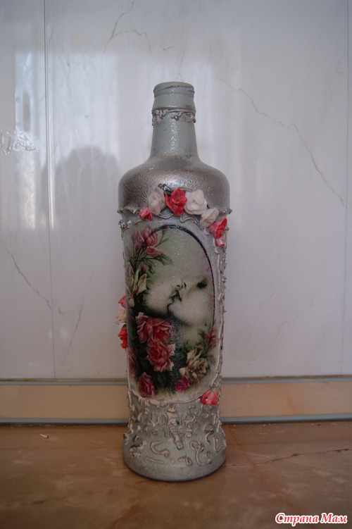 Мои бутылочки и вазочки.