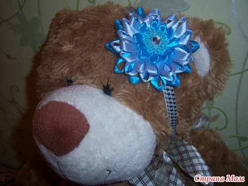 То ли бантик, то ли цветочек:) Мое