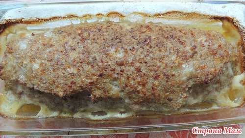 Мясной рулет из фарша с яйцом.