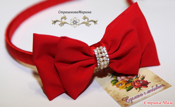 Канзаши из ткани. Мне понравилось.