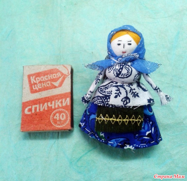 кукла на катушечной шпульке.