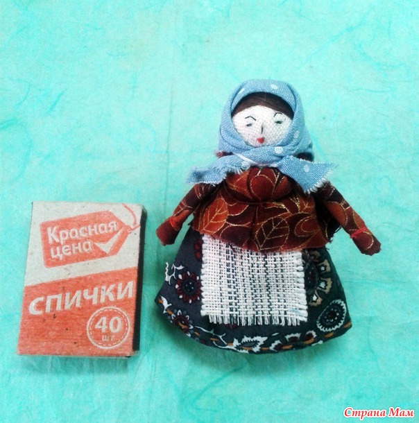 кукла на катушечной шпульке.