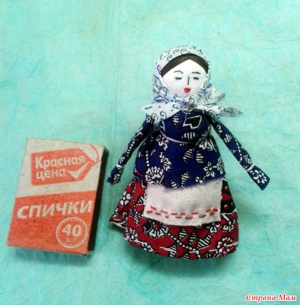 кукла на катушечной шпульке.