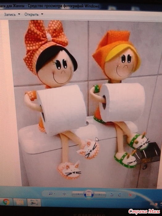 Кукла-держатель для туалетной бумаги