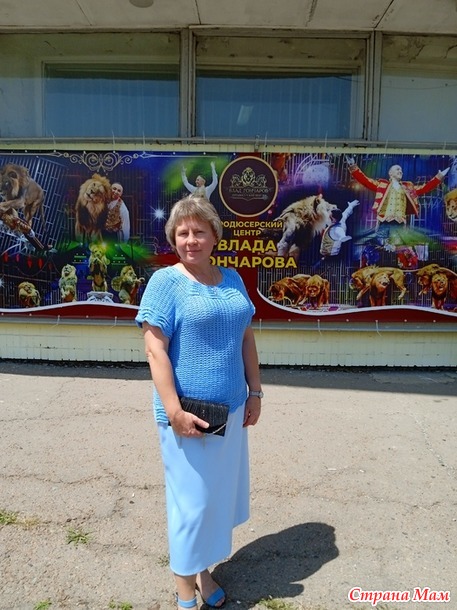 Голубая блузка